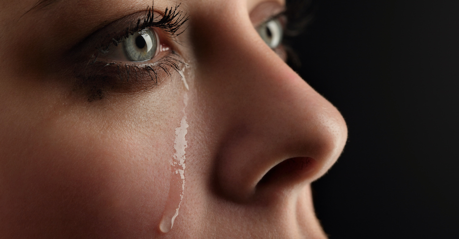 Frau mit Tränen im Gesicht | Credit: iStock.com/Chepko