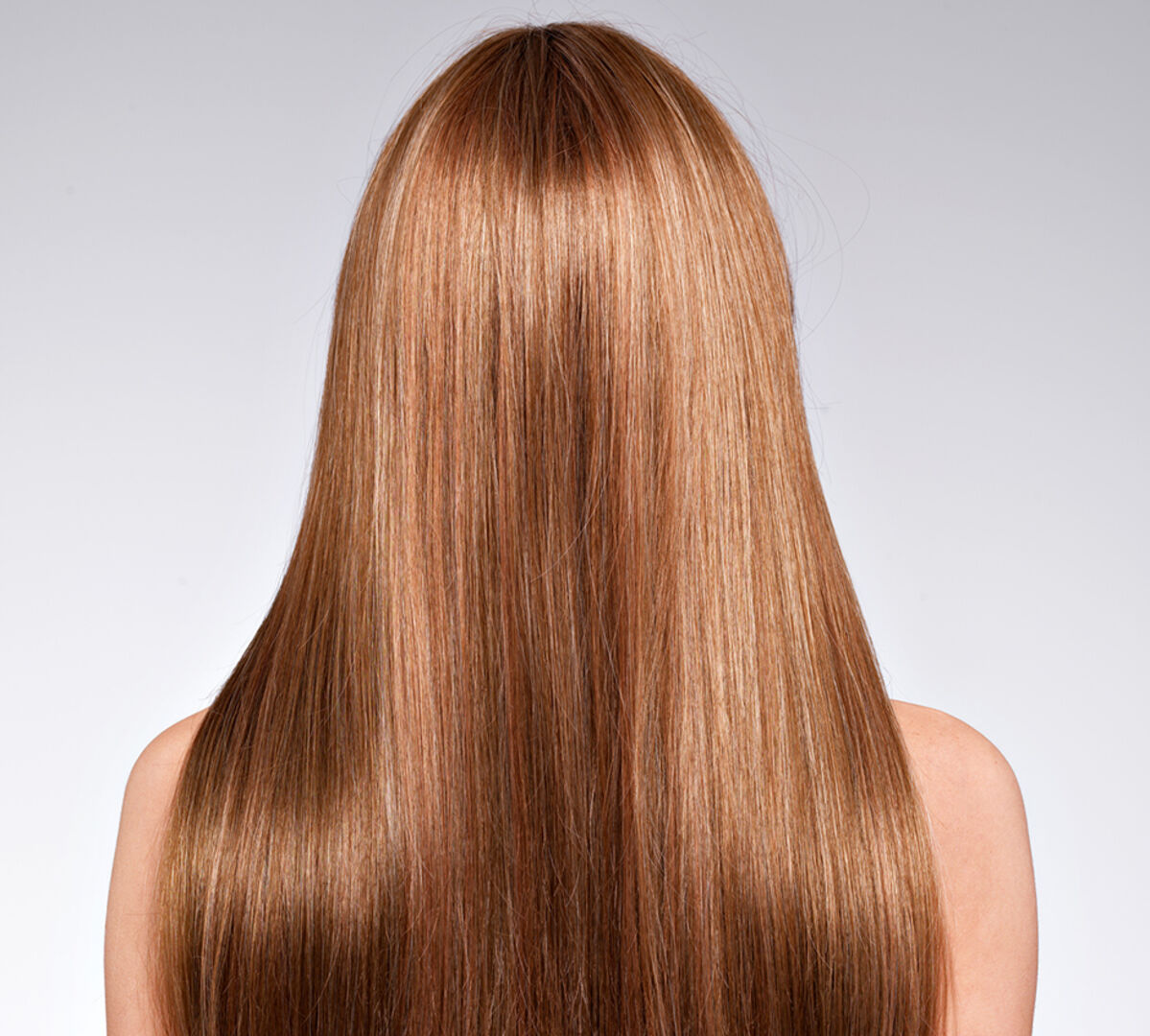 Frau von hinten mit schönem, langen Haar | Credit: iStock.com/ValuaVitaly