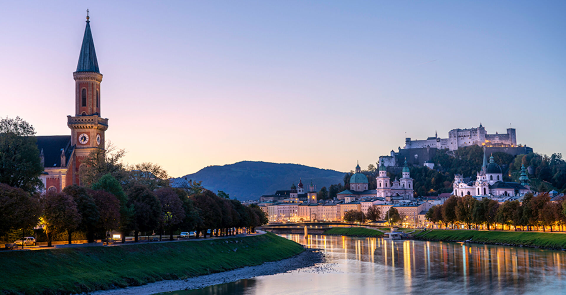 Blick auf Salzburg und die Hohensalzburg im Sonnenuntergang | Credit: iStock.com/Ghing