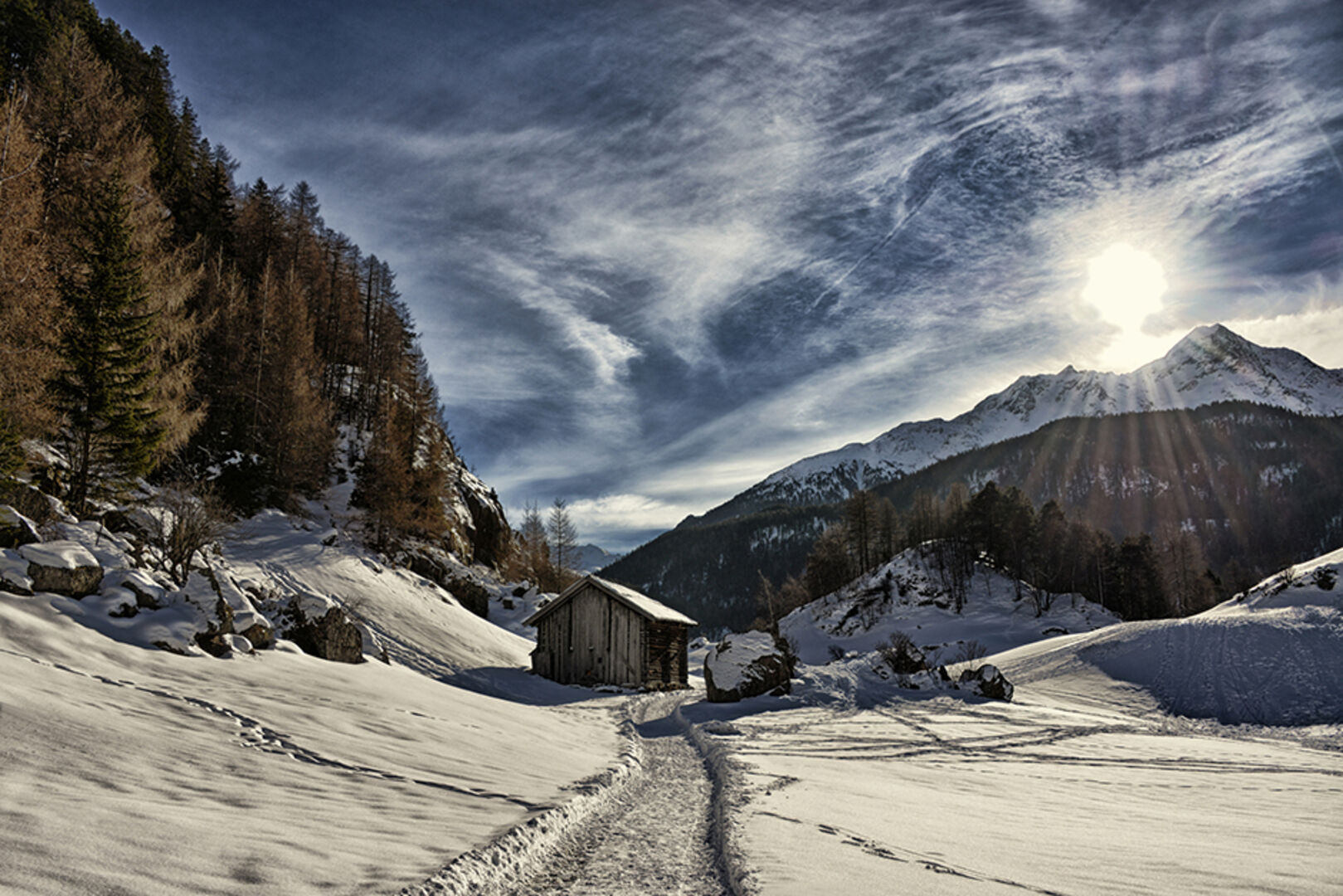 Hütte im Schnee in Sölden | Credit: iStock.com/MarieClaudeHH