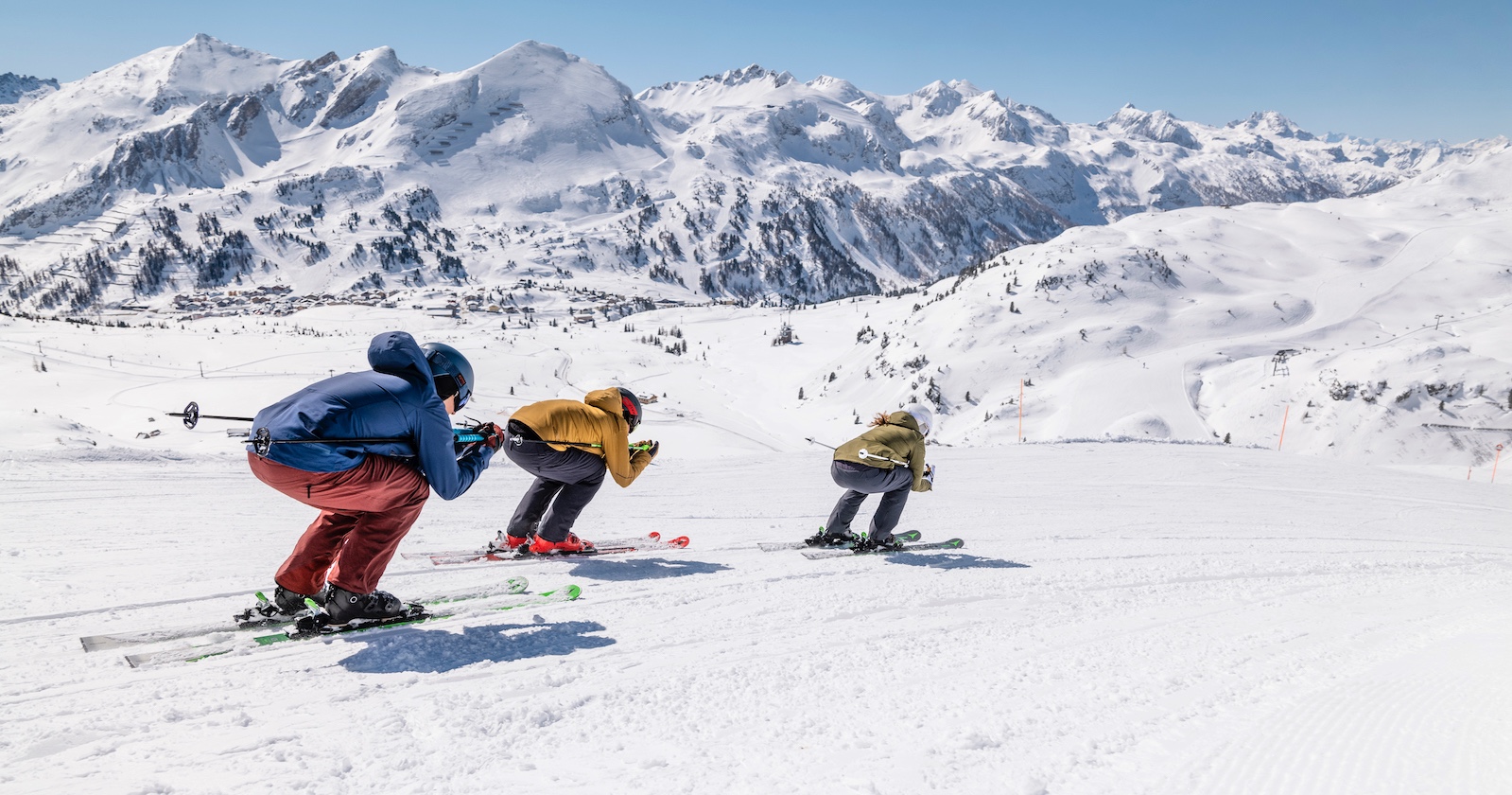 Drei Skifahrer auf Salzburgs Pisten. | Credit: SalzburgerLand Tourismus