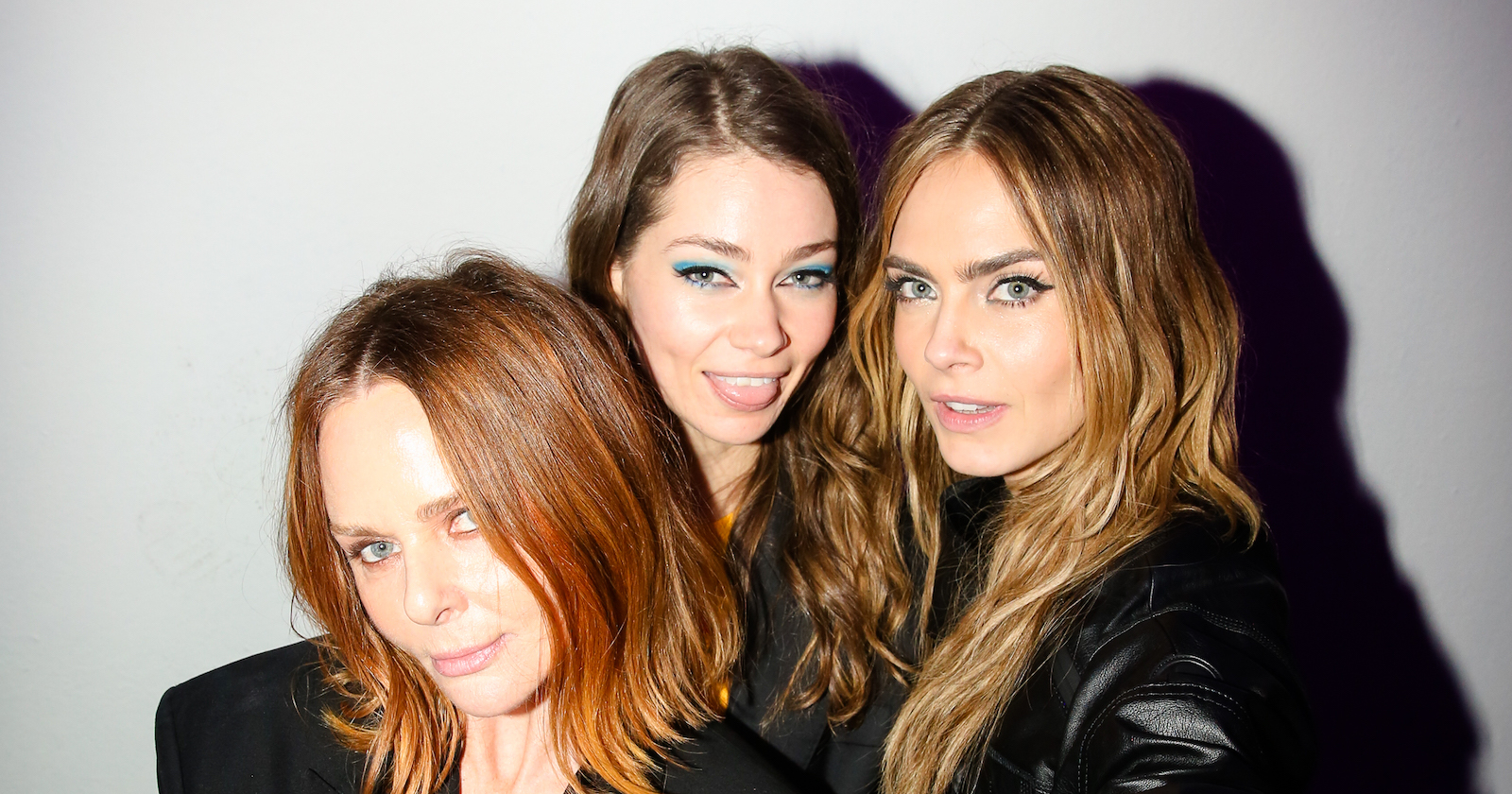 Cara Delevingne mit Leah Mason und Stella McCartney.