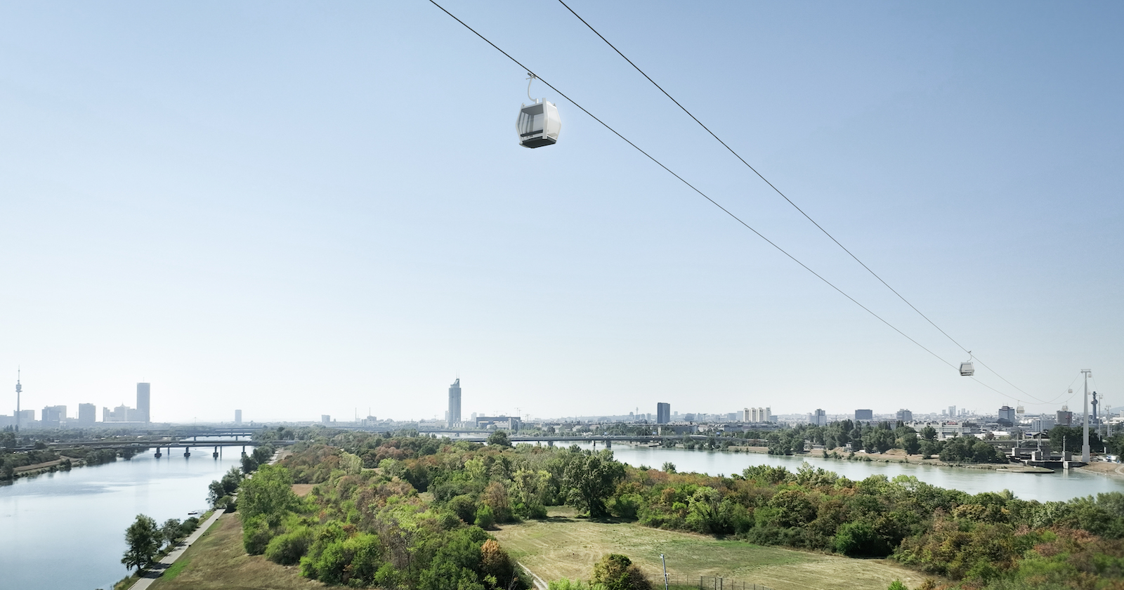 Seilbahn über der Wiener Donauinsel an einem sonnigen Tagv | Credit: ZOOM VP.AT/Genial Tourismus- &amp; Projektentwicklung GmbH