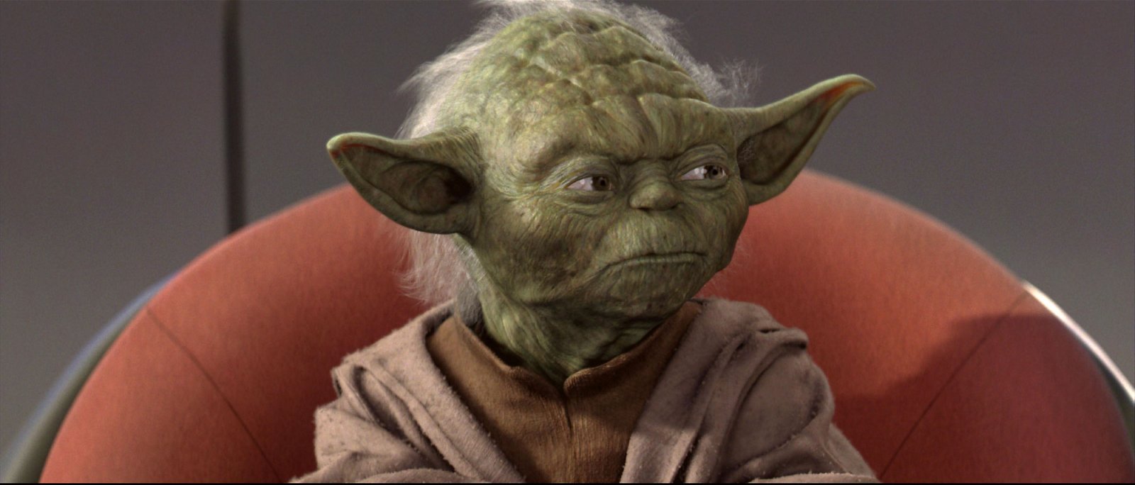 Meister Yoda sitzt in einem Sessel | Credit: LUCASFILMS / Mary Evans / picturedesk.com