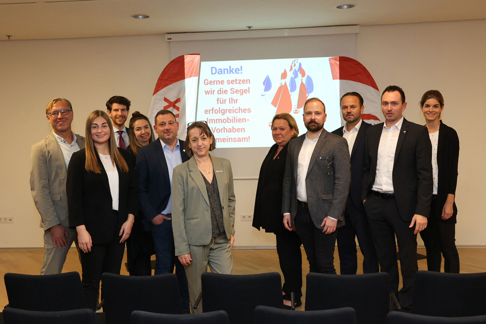 Die RE/MAX-Mitarbeiter mit den Referenten.