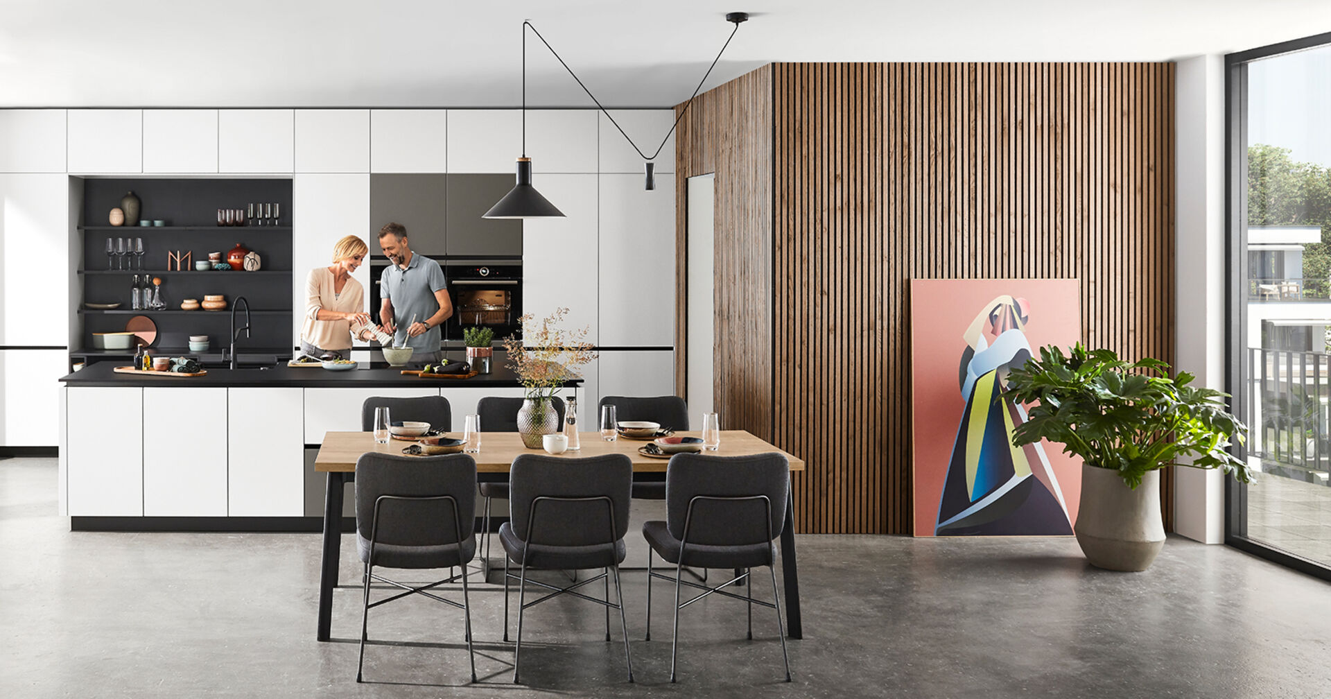 Moderne Wohnküche in hellen Tönen | Credit: XXXLutz