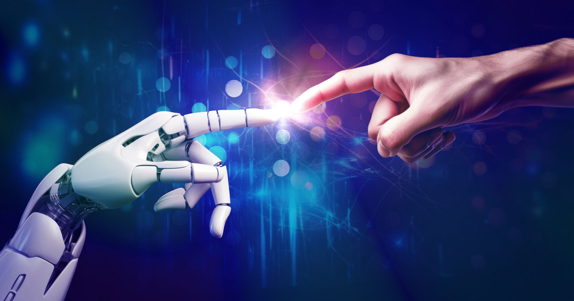 Eine Roboterhand und eine Menschenhand berühren sich