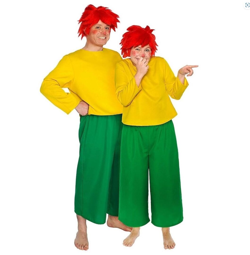 Ein Mann und eine Frau im Pumuckl Kostüm