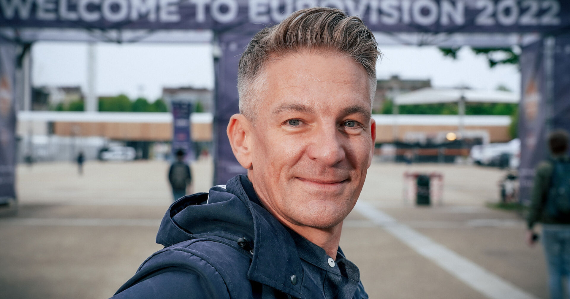 Andi Knoll mit einer blauen Jacke.