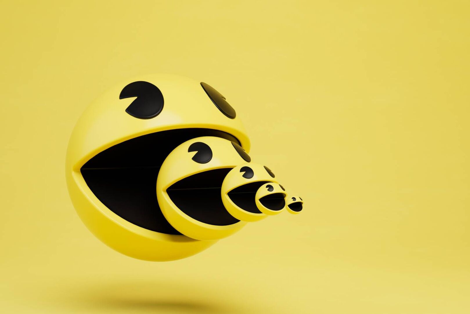 Spielfigur &quot;Pac-Man&quot; auf gelben Hintergrund