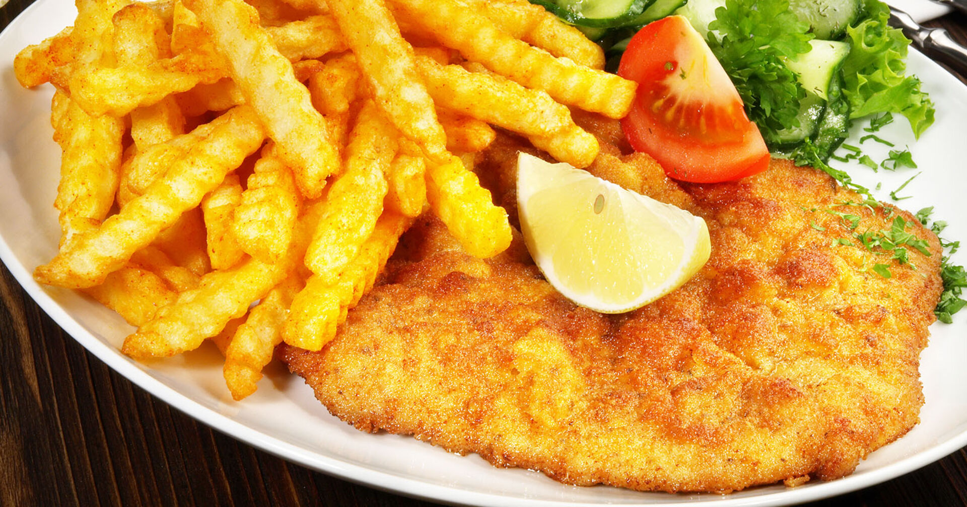 Schnitzel auf einem Teller | Credit: iStock.com/pixura