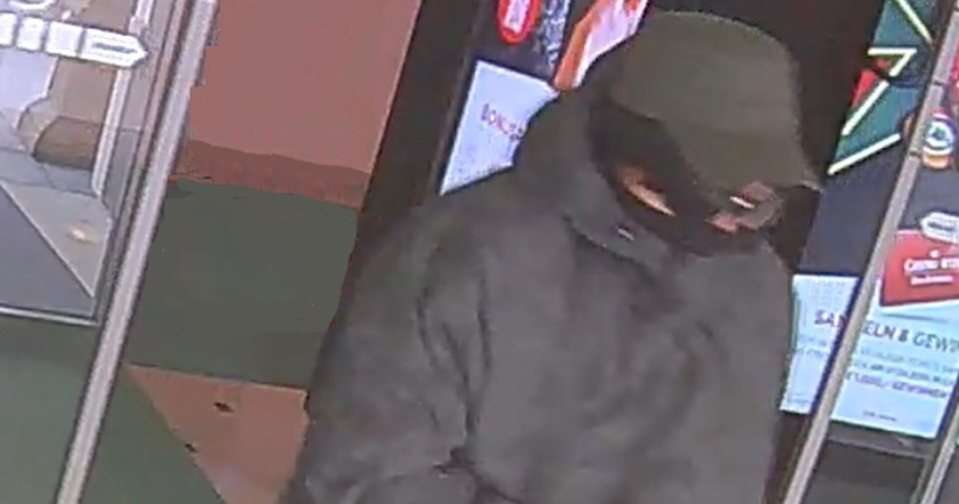 Fahndungsfoto des vermummten Täters.