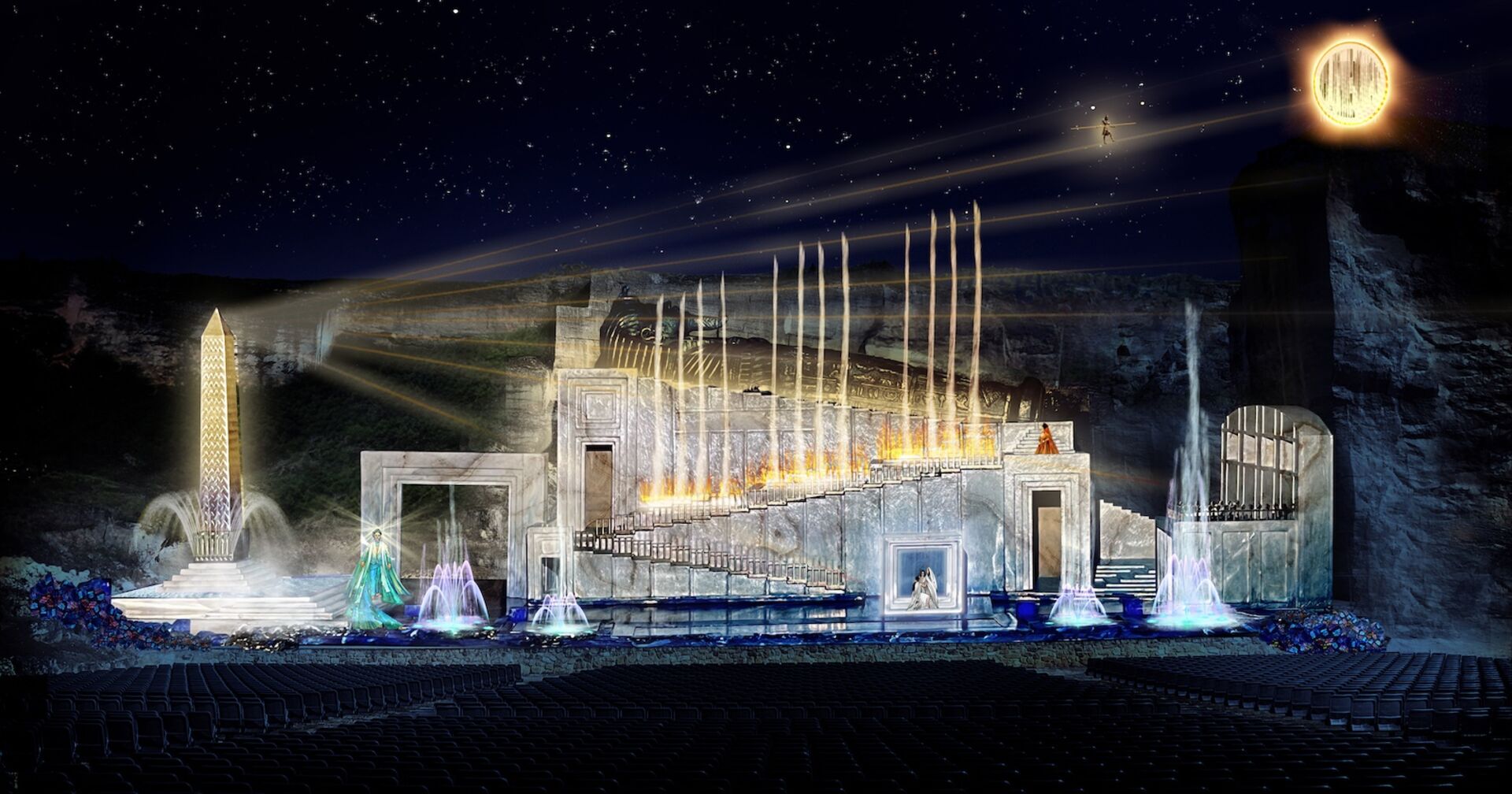 Bühnenbild, hauptsächlich dunkel, mit Lichteffekten