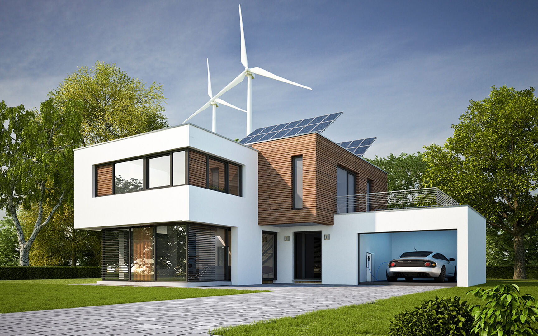 Modernes Wohnhaus vor einer Windkraftanlage | Credit: iStock.com/Oliver Hasselluhn