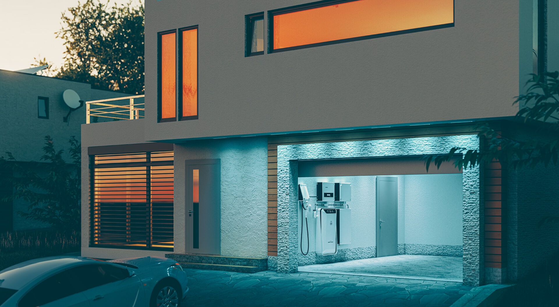 Garageneinfahrt zu modernem Wohnhaus in der Abenddämmerung | Credit: iStock.com/Petmal