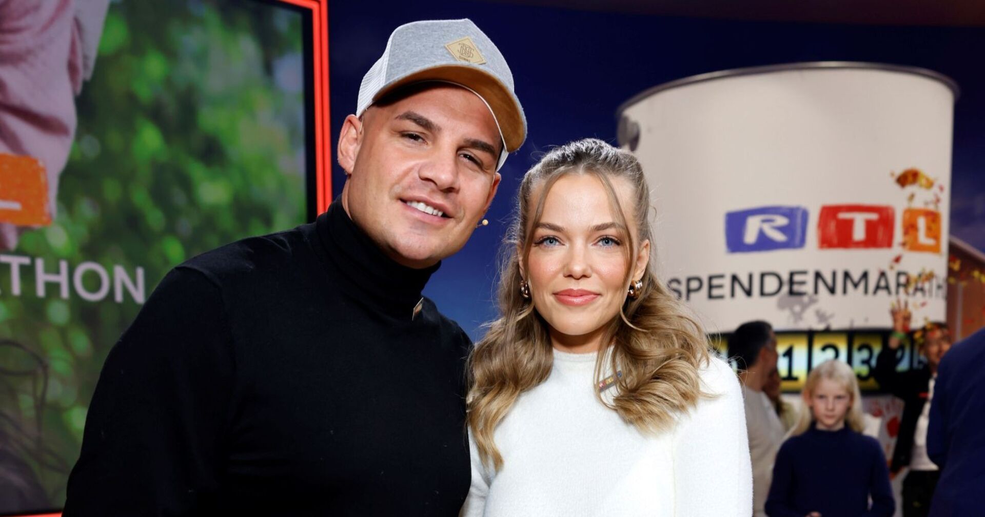 Pietro und Laura lächeln in die Kamera