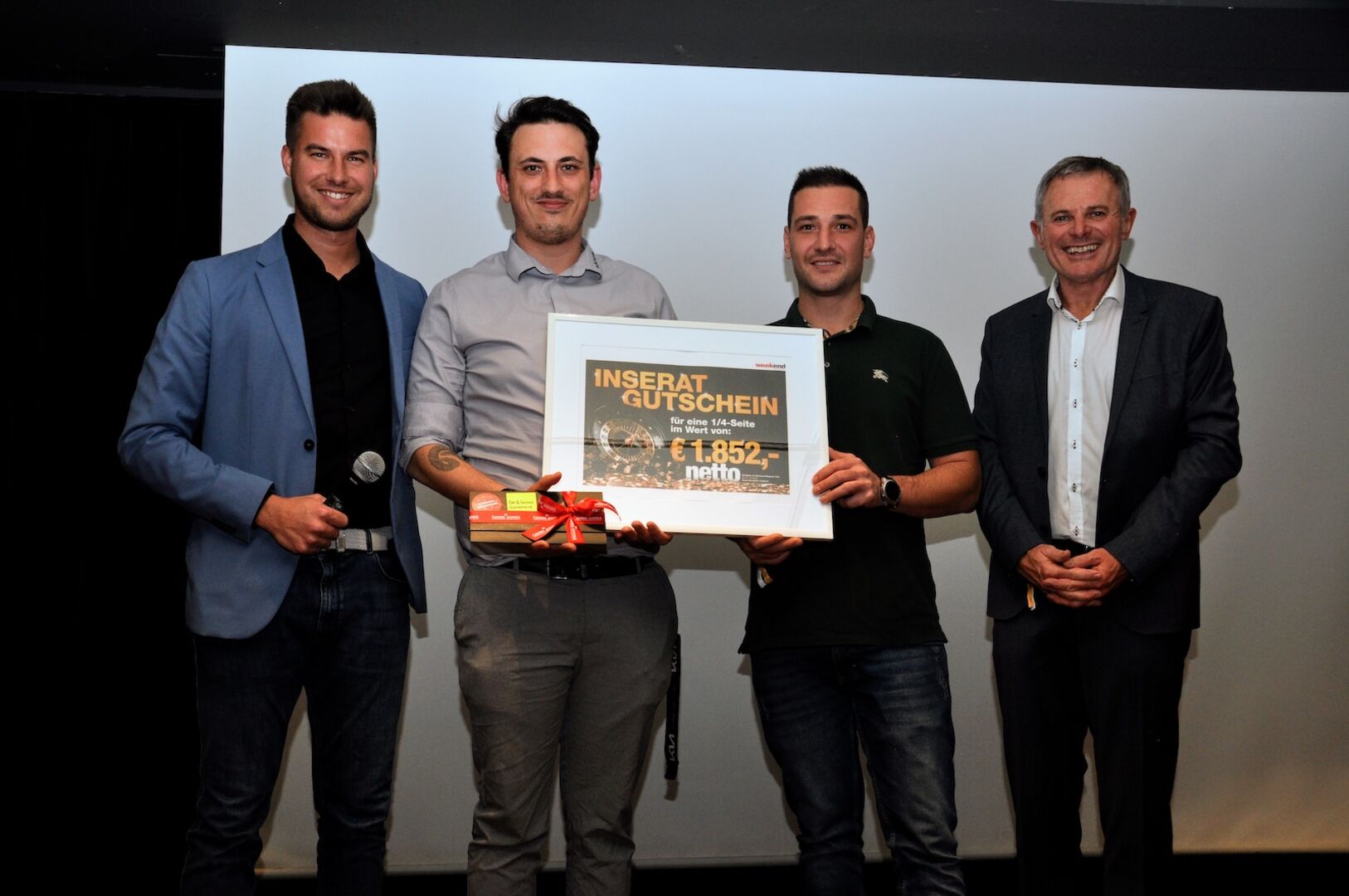 4 Männer bei Preisverleihung