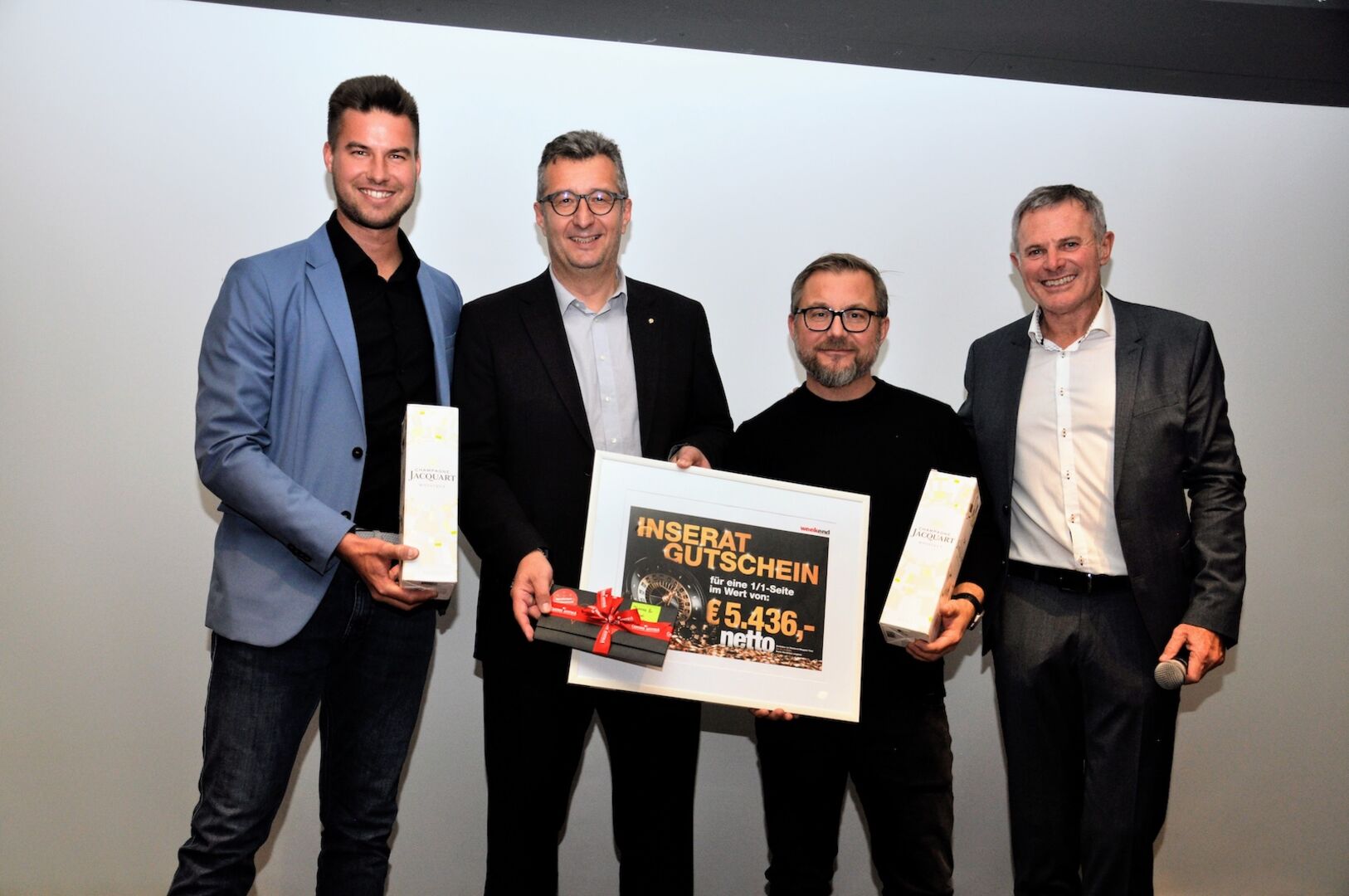 4 Männer bei Preisverleihung