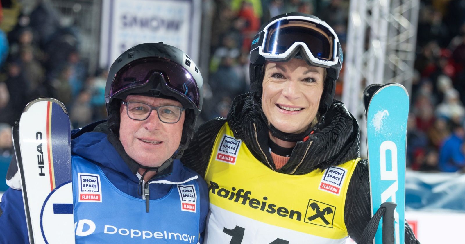 Ralf Rangnick und Maria Höfl-Riesch im Zielraum der Piste