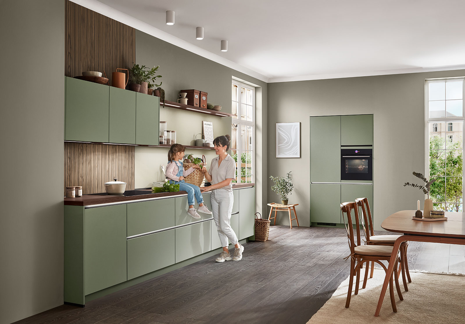 Moderne Wohnküche in soften Grüntönen | Credit: XXXLutz