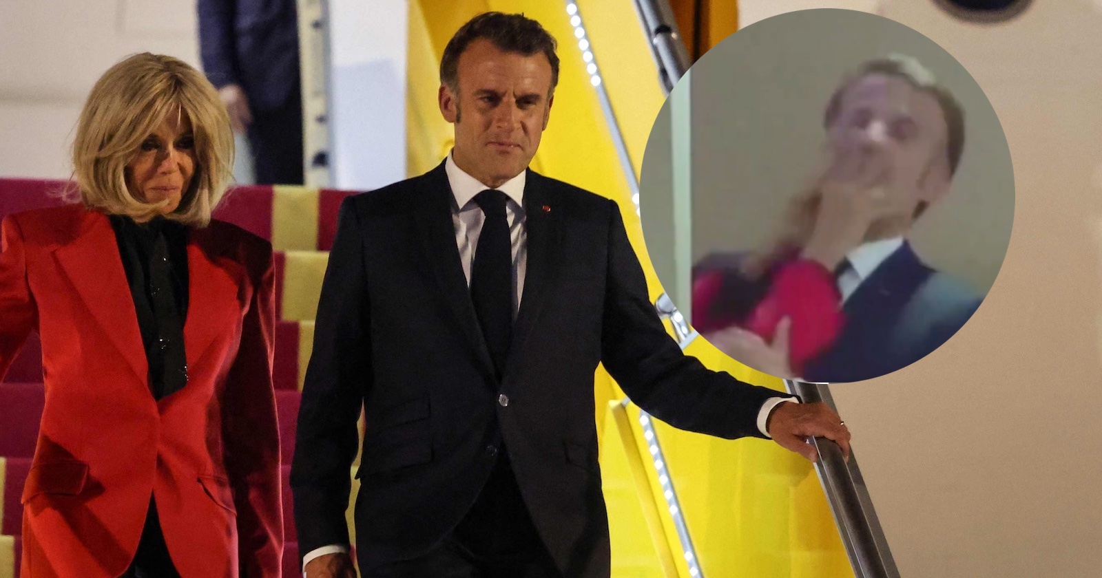 Emmanuel Macron im dunklen Anzug und Brigitte Macron in roter Jacke beim Verlassen eines Flugzeugs in Vietnam. In einem eingeblendeten Kreis ist ein Videoausschnitt zu sehen, in dem Brigitte Macron ihrem Ehemann scheinbar mit der Hand ins Gesicht fasst.