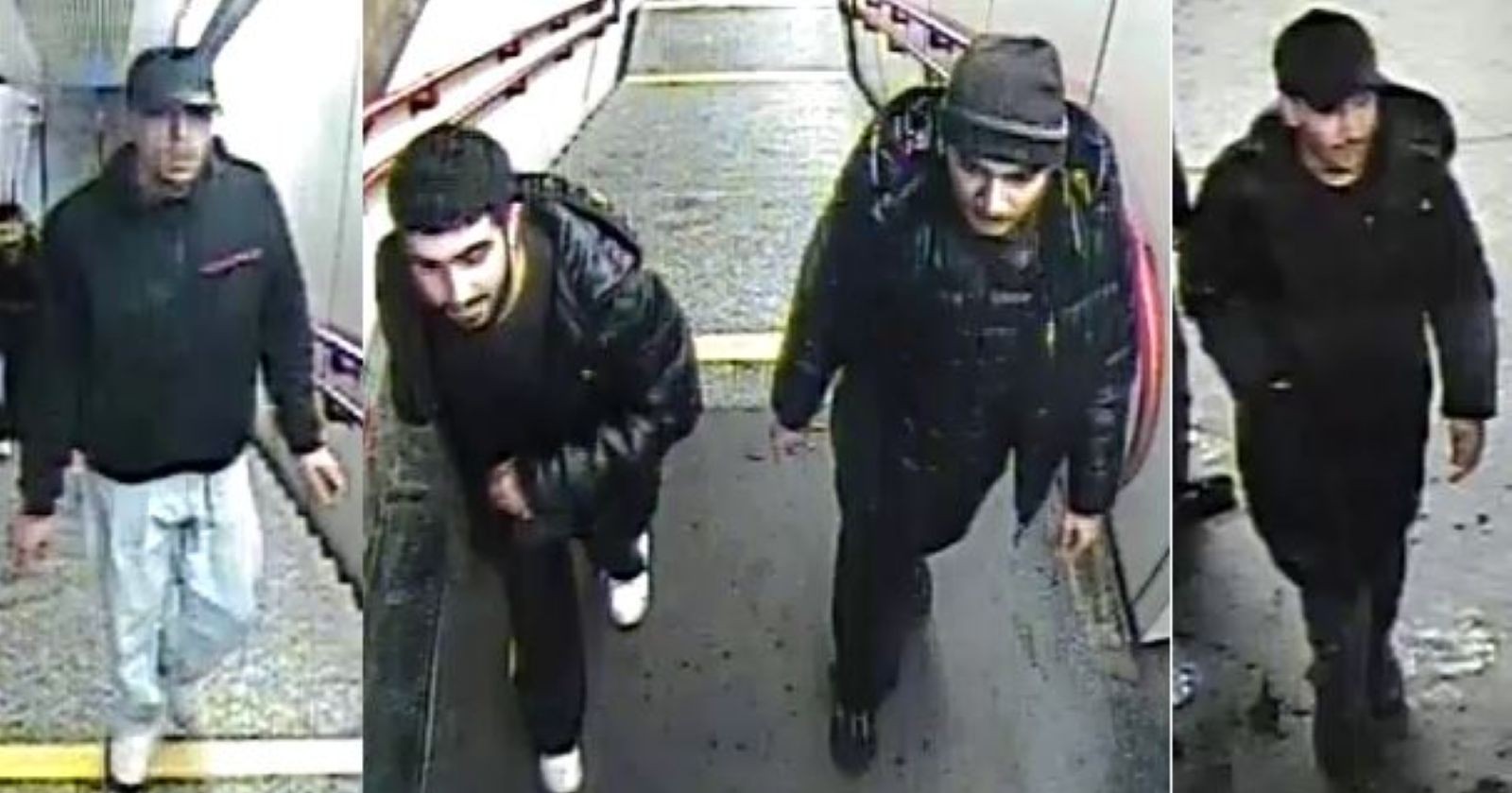 Schwarz gekleidete Männer, drei davon tragen dunkle Kopfbedeckung, einer eine hellblaue Jeans