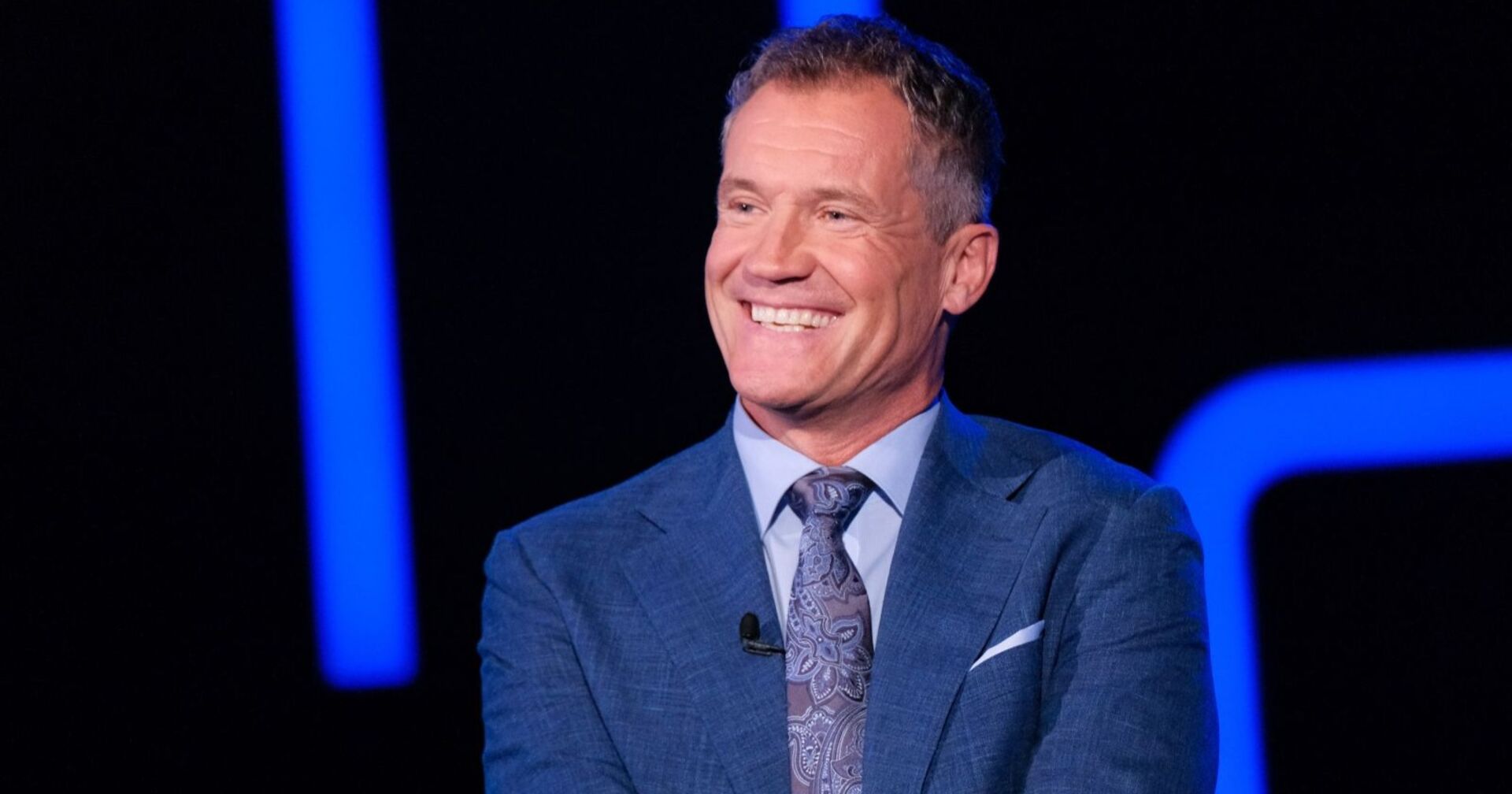 Armin Assinger lächelt