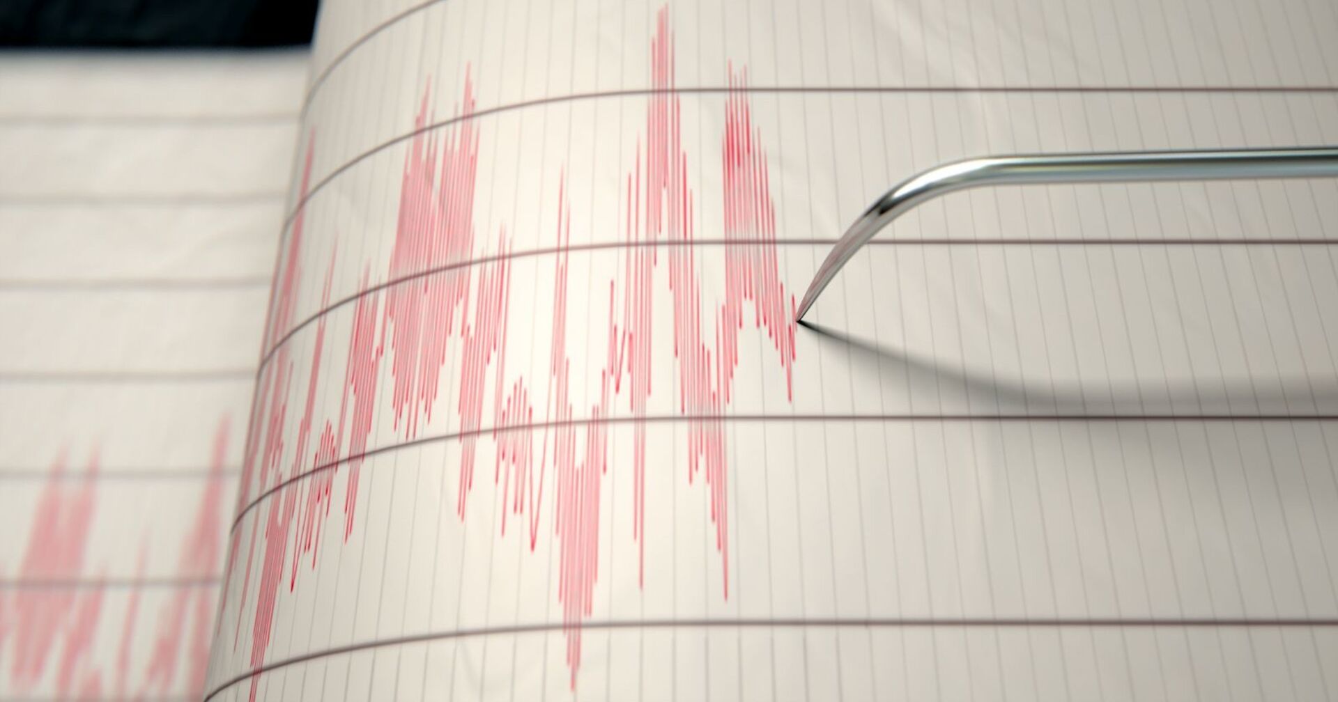 Ein Seismograph der die Ausschläge eines Erdbebens aufzeichnet