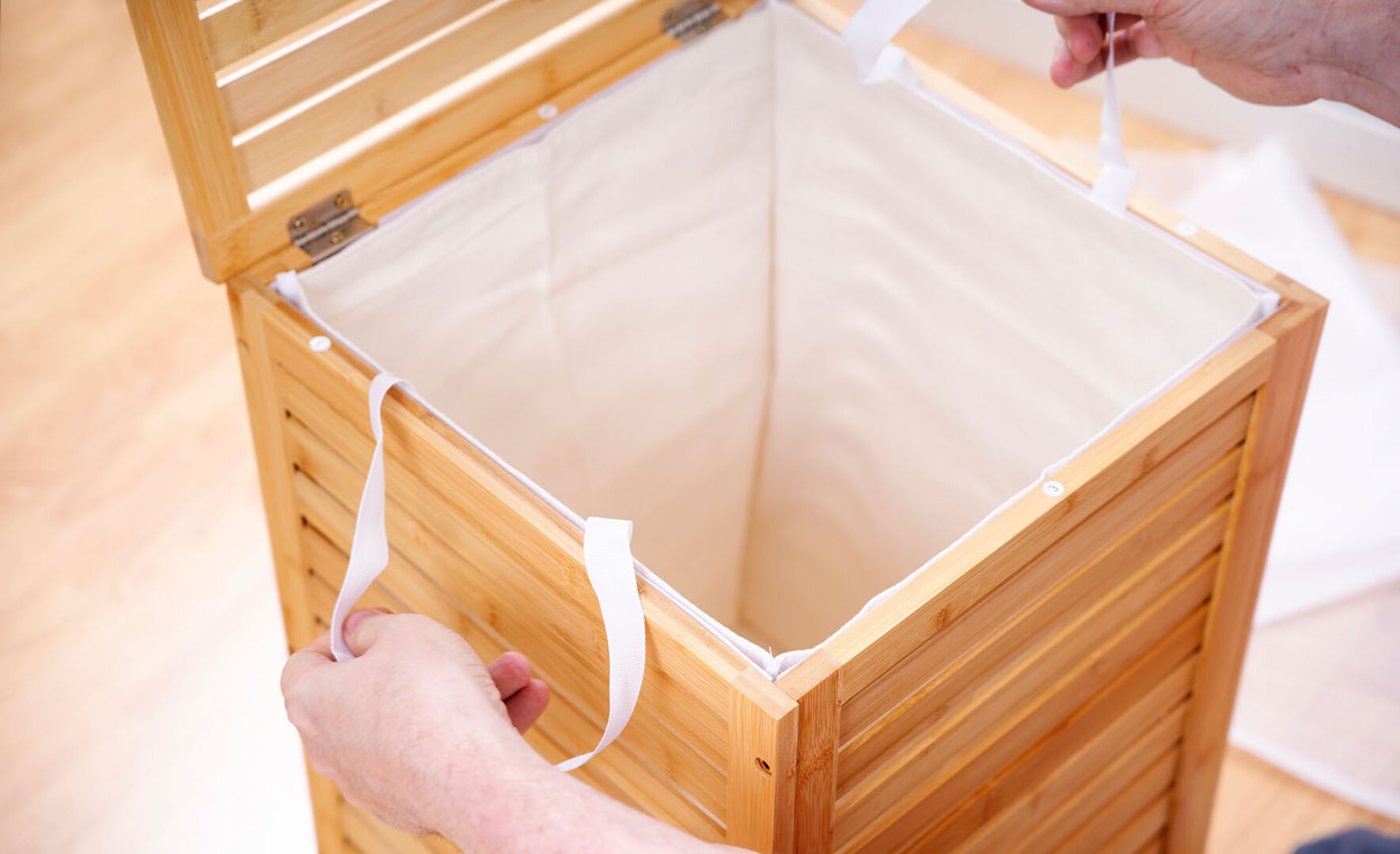 Wäschekorb aus Holz | Credit: iStock.com/William DondyK