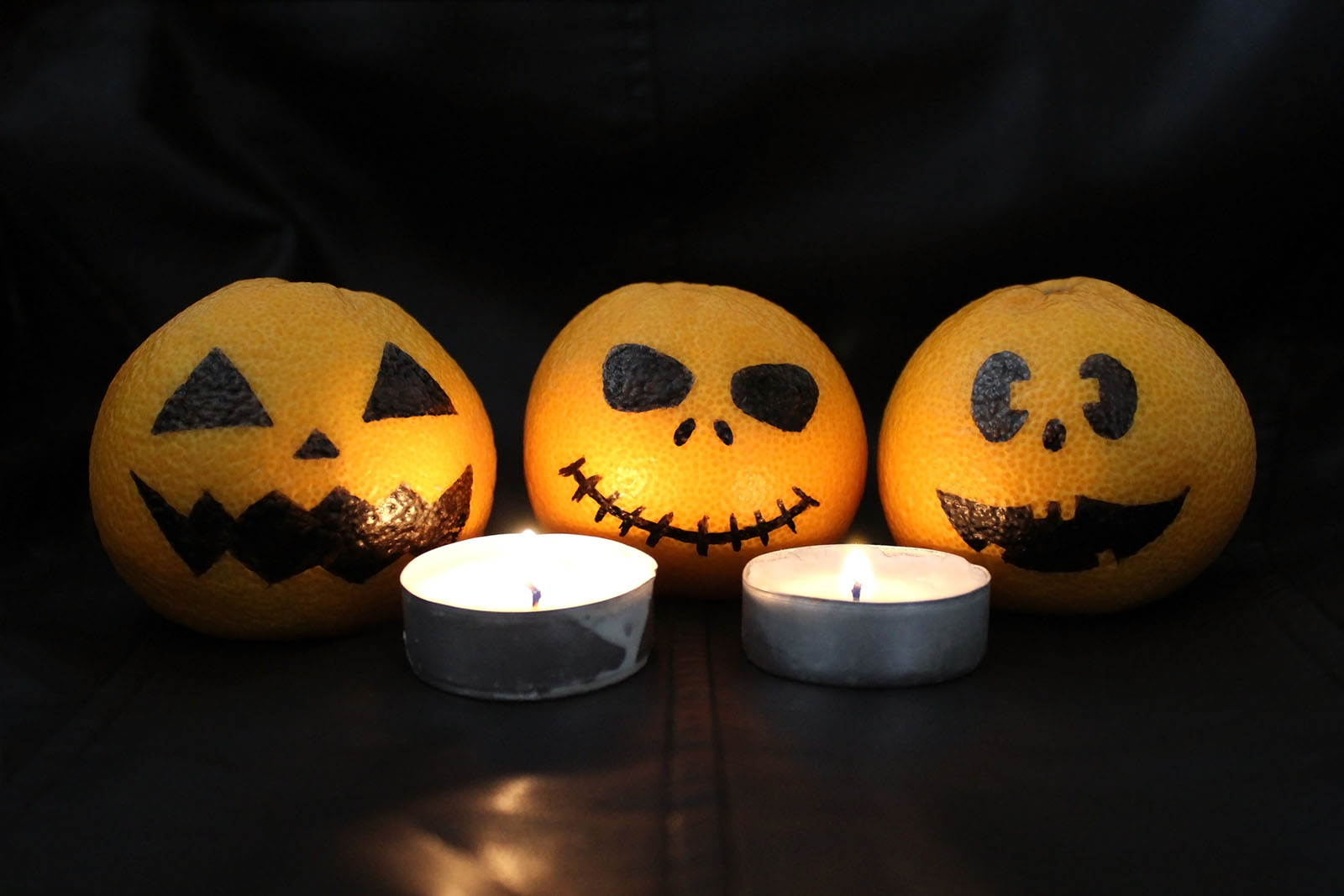 Mandarinen Halloween-Kürbisgesichter | Credit: iStock.com/Khris