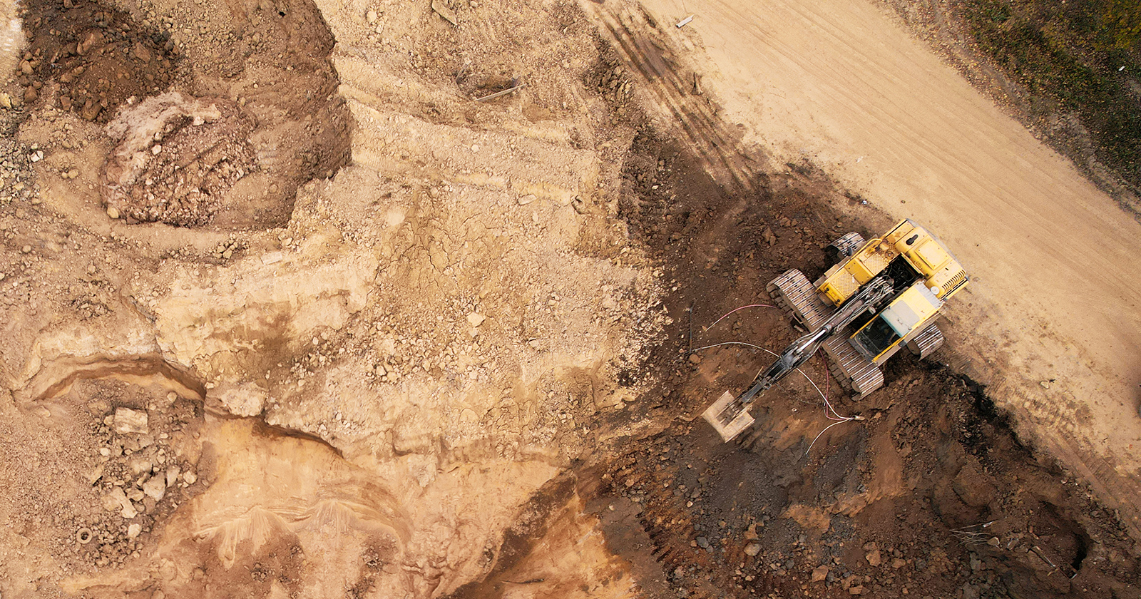 Bagger im Erdbau | Credit: iStock.com/Getty Images Plus/Maksim Safaniuk