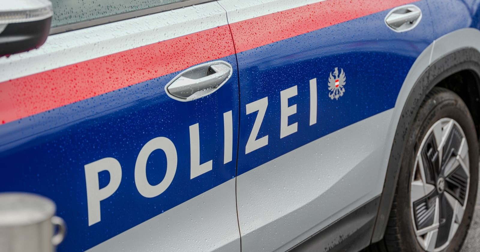 Aufschrift auf Polizei-Auto