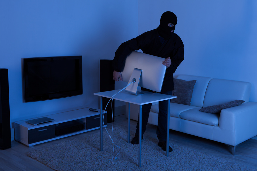 Thief Stealing Computer Monitor From Living Room