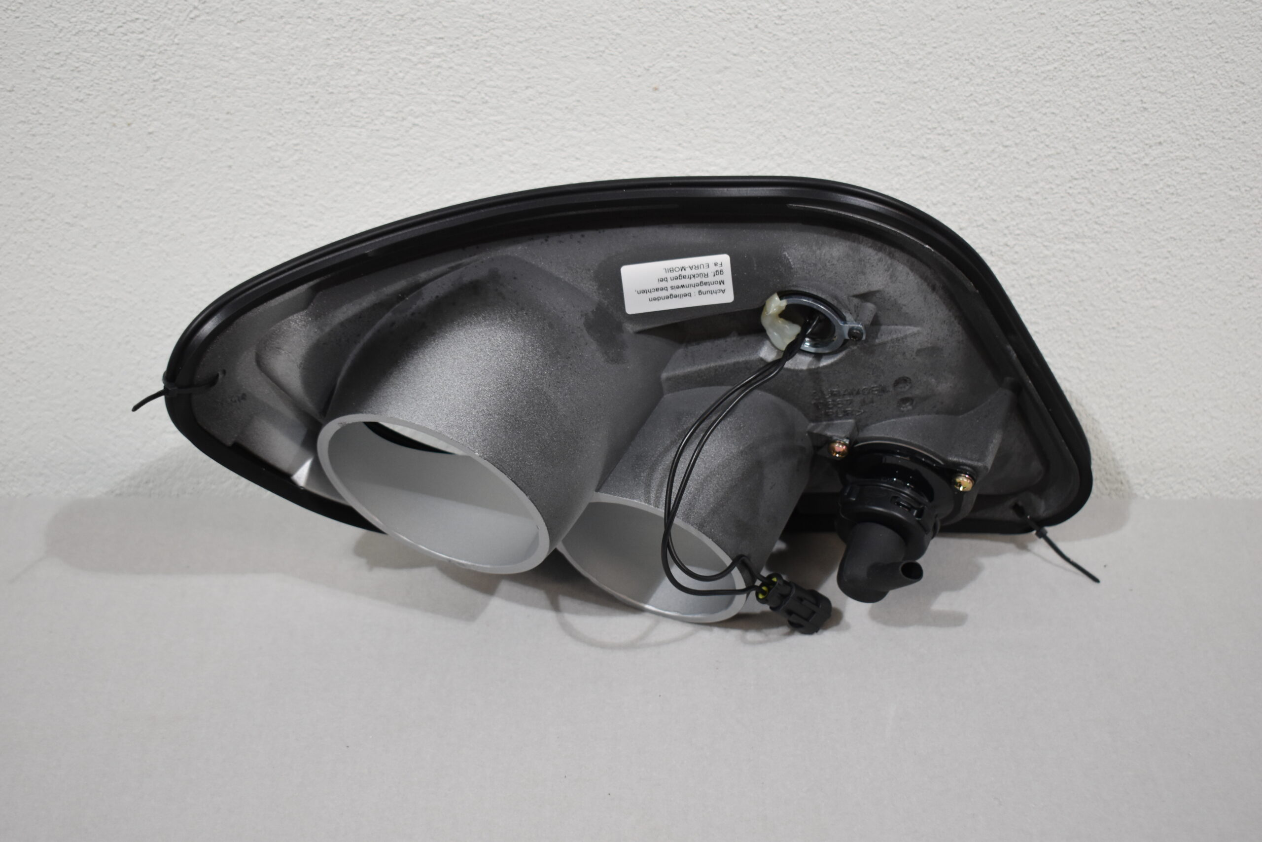 Leuchtenträger Blende links; inkl. Positionsleuchte u. Blinker