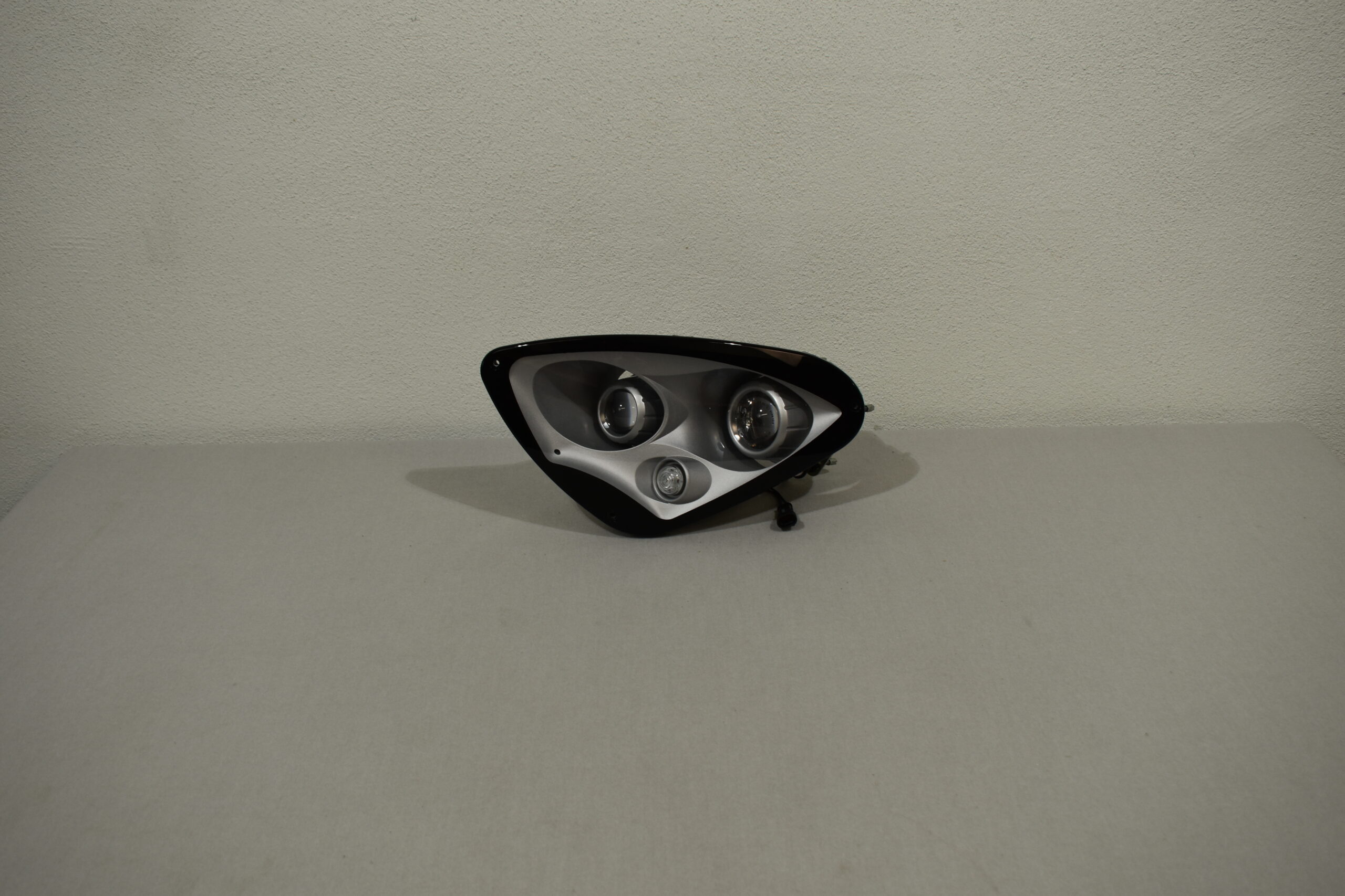 Leuchtenträger einteilig links IM1