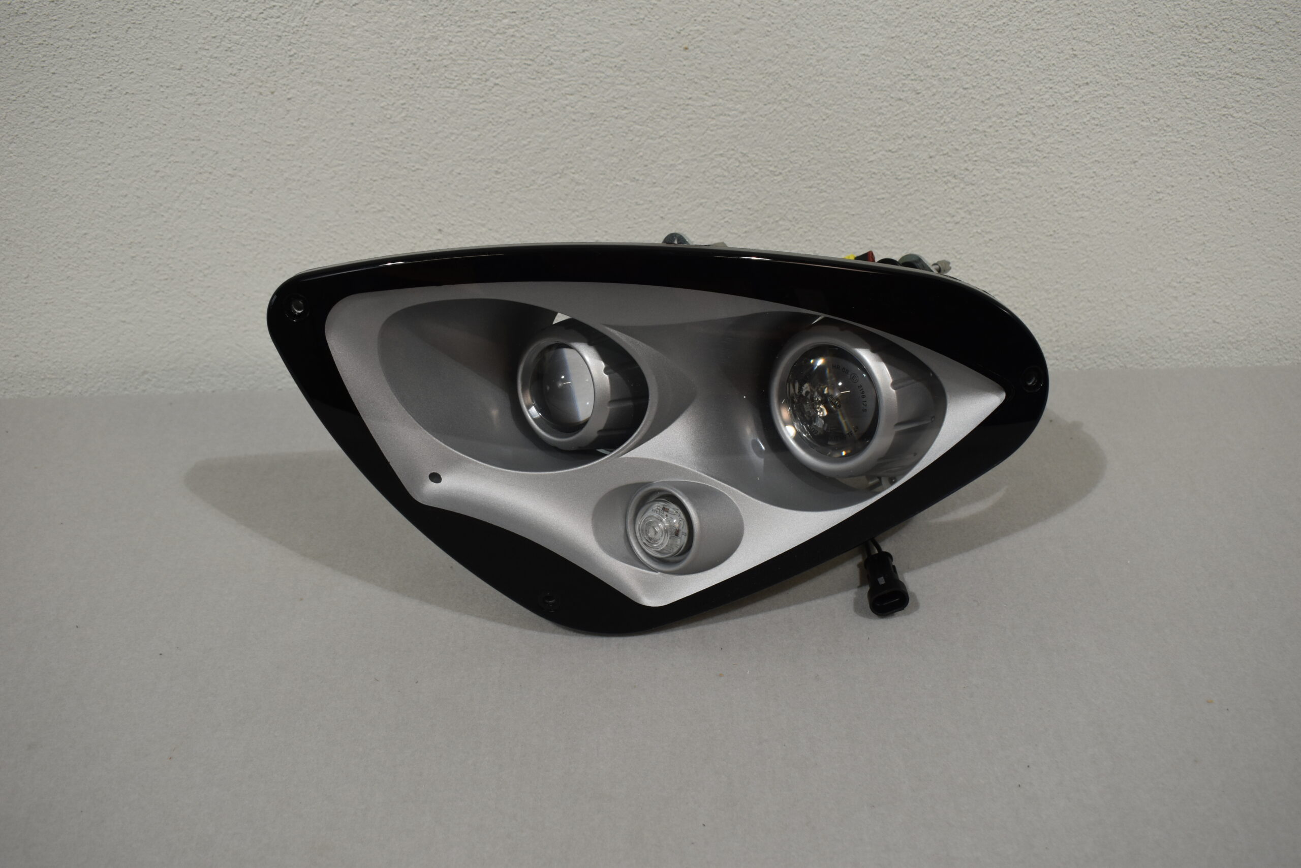 Leuchtenträger einteilig links IM1