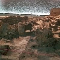 Two neolithic dwellings  by Zoë Sheng