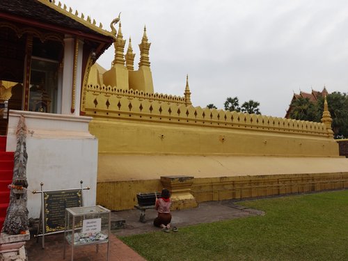 Prayer in front of the wat