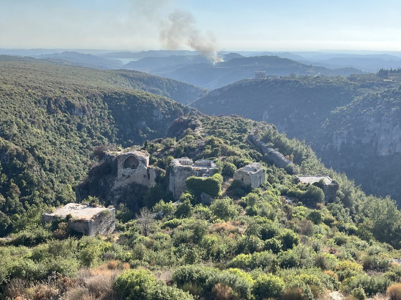 Byzantine remains of Saladin Castle, with smoke in the distance