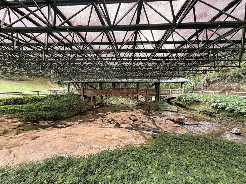 View of the sculpted river spring and the bridge to see it