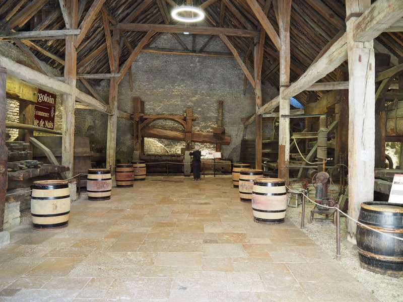 Wine barrels in a barn in Beaune