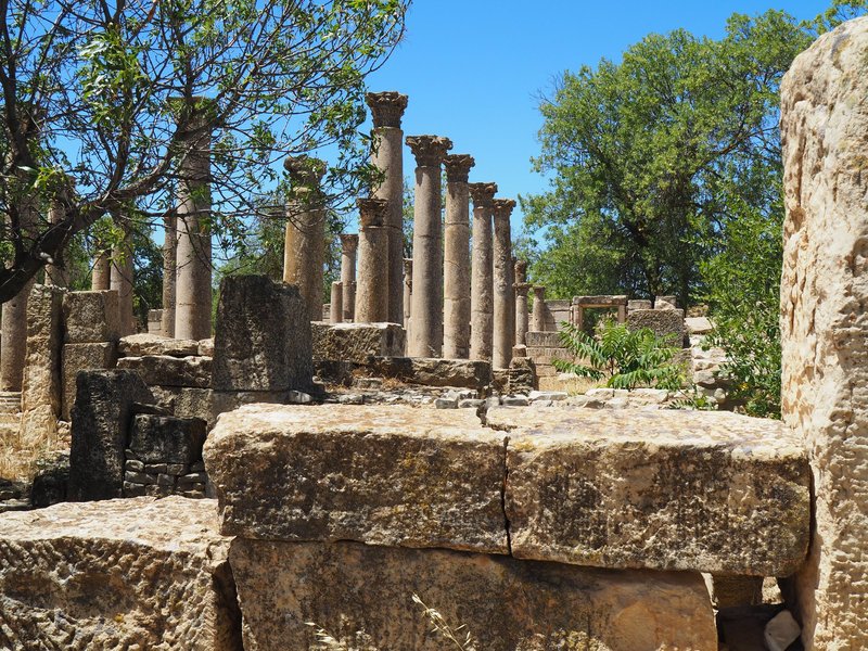 The megalithic tombs are located to the right of the Schola des Juvenes
