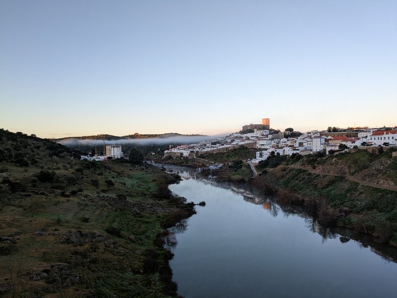 View of Mertola at sunrise across Río Guadiana