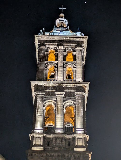 One of the bell tower's of Puebla's cathedral, nicely lit at night