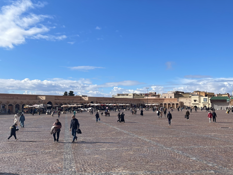 An overview of people walking the square in Meknes