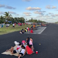 Relaxing at Funafati landing strip by Bram de Bruin