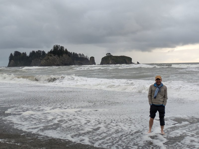 Standing on the shorelines of the Pacific Ocean at Rialto Beach.