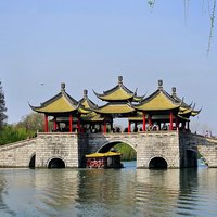 Slender West Lake and Historic Urban Area in Yangz by Roman Bruehwiler